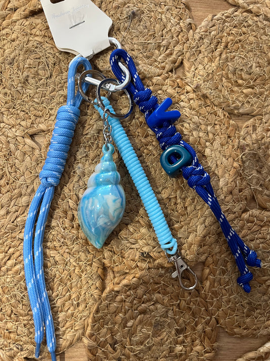 Grigri coquillage bleu 🐚